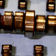 Screenshot: GearHeads/YouTube. Lifters shown below and above. Camshaft shown in the middle.